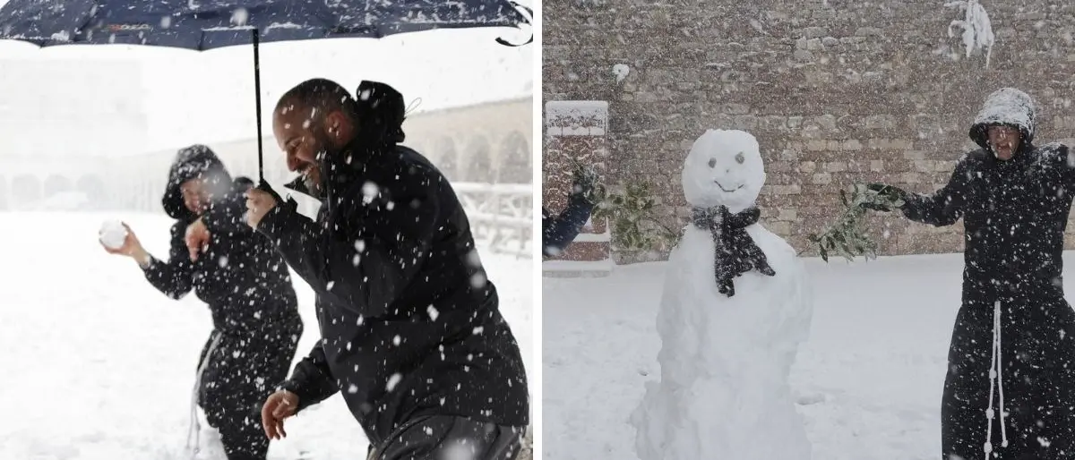 Assisi si sveglia imbiancata e i frati giocano a palle di neve davanti alla Basilica di San Francesco: il video