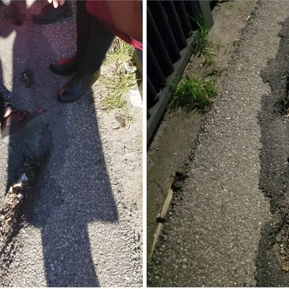 Anziana cade a terra a causa di una buca e rischia di essere travolta da un’auto in transito