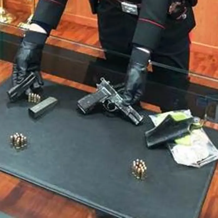 Cosenza, pistola e munizioni in camera da letto: arrestato 24enne