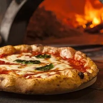 La pizza è il piatto che regala la felicità. Battuta anche la pasta