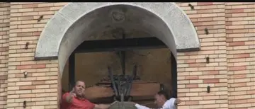 VIBO, LAVORATORI EX EUROCOOP SCENDONO DAL CAMPANILE DI PALAZZO LUIGI RAZZA