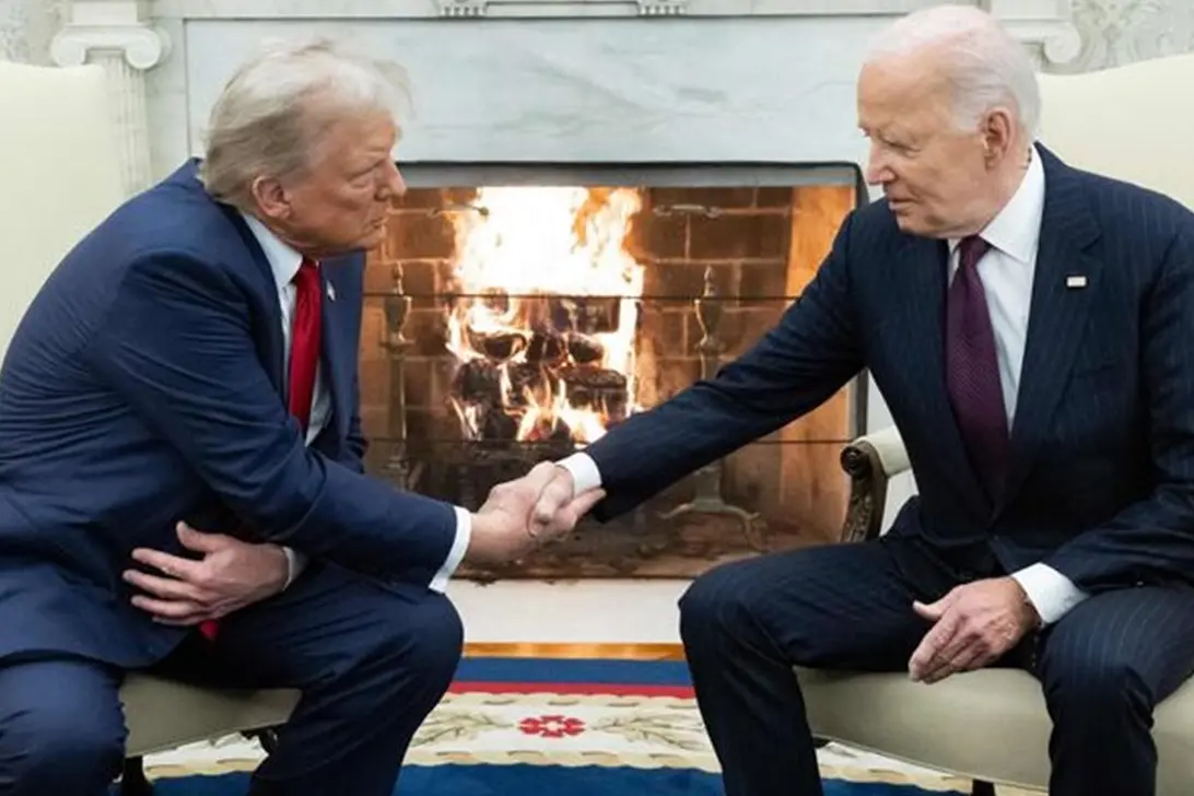 US President Joe Biden shakes hands with US President-elect Donald Trump during a meeting in the Oval Office of the White House in Washington, DC, on November 13, 2024. (Photo by SAUL LOEB / AFP) , AFP