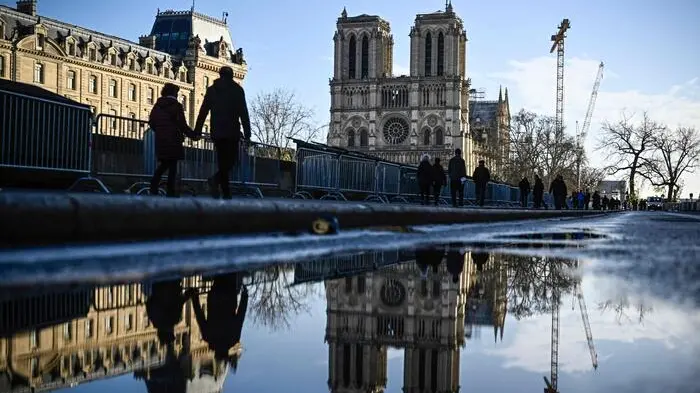 <p>Notre Dame riapre le porte al mondo (foto Ansa)</p>\\n , AFP