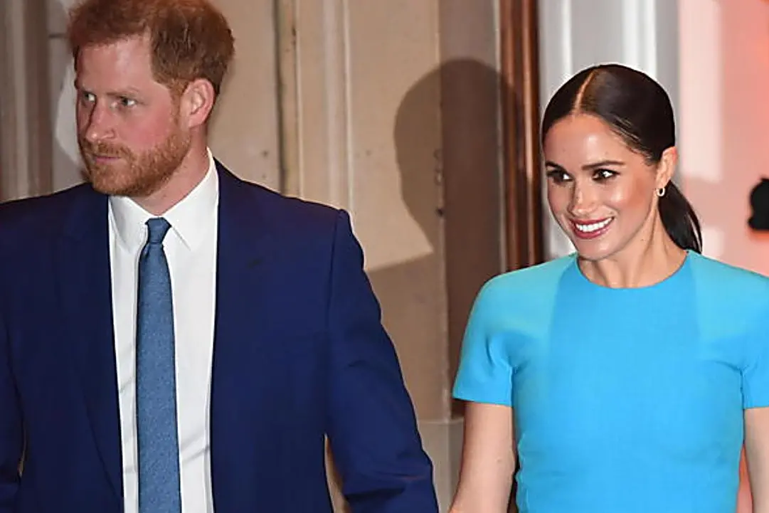 <p>Il principe Harry con la moglie Meghan Markle (foto Ansa)</p>\\n