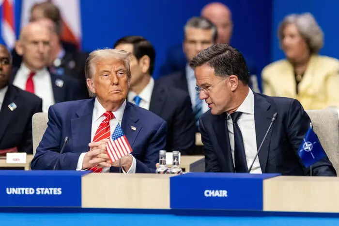 epaselect epa12196228 (L-R) US President Donald J. Trump and NATO chief Mark Rutte take a seat at the beginning of the NATO Summit at the World Forum in The Hague, The Netherlands, 25 June 2025. The Netherlands, for the first time in NATO\\'s history of existence, is hosting a NATO summit. EPA/SEM VAN DER WAL , EPA