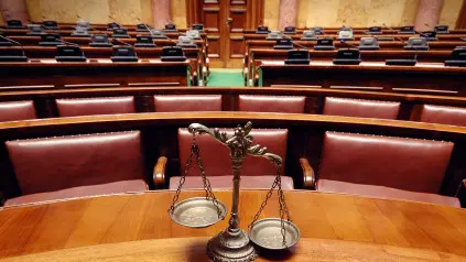 Decorative Scales of Justice in the Courtroom , Getty Images/iStockphoto