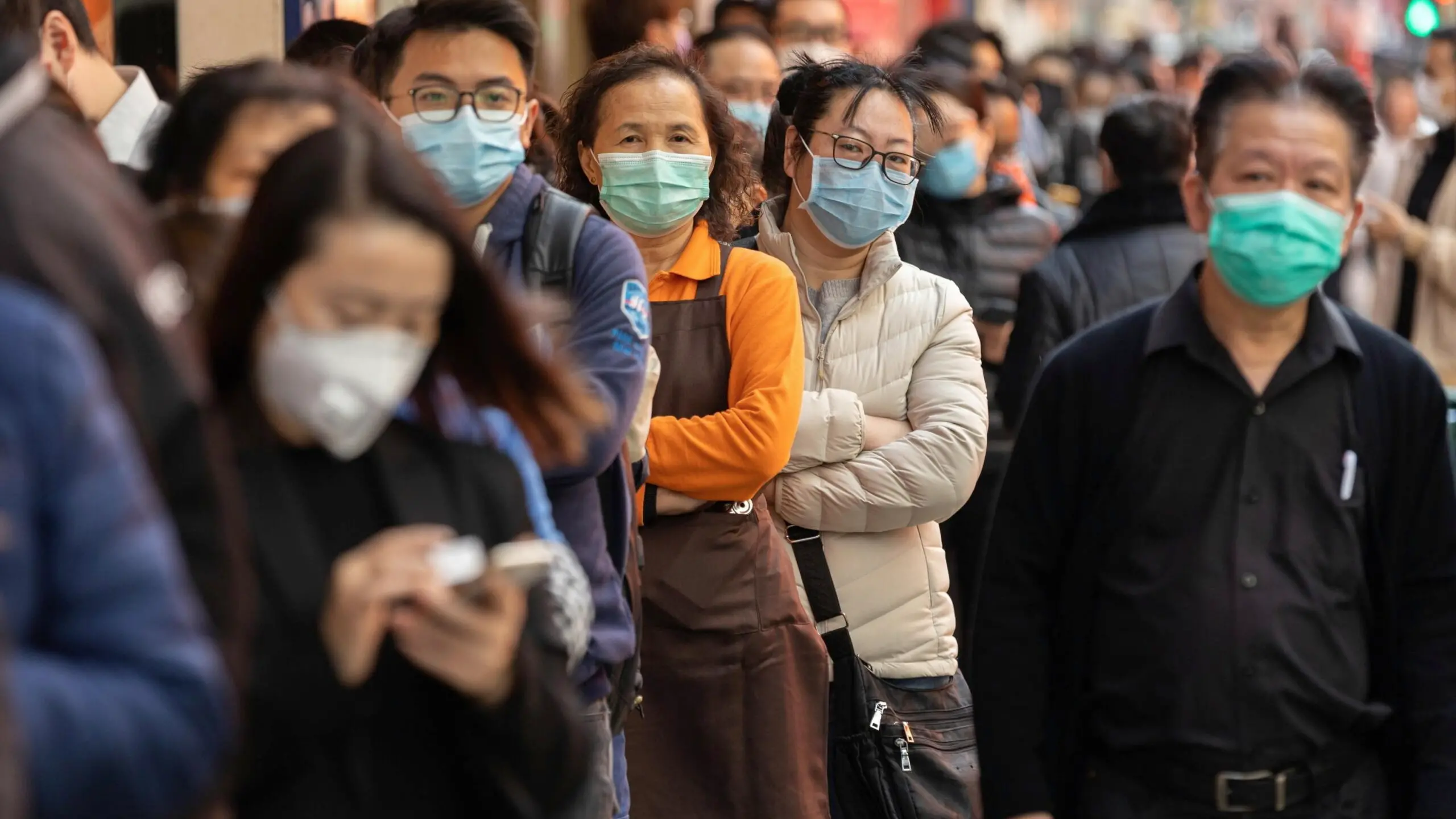 epa08180711 People line up to buy face masks outside a pharmacy in Hong Kong, China, 31 January 2020. Hong Kong extended the suspension of schools and kindergartens to 02 March 2020 at the earliest after at least 10 people were infected with the Wuhan coronavirus. The virus originated in the Chinese city of Wuhan and has so far killed at least 213 people, infecting over 9,000 others, mostly in China. EPA/JEROME FAVRE , EPA