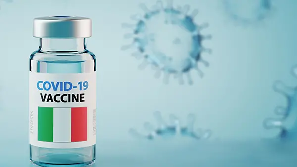 COVID-19 Coronavirus Vaccine and Syringe with flag of Italy Concept Image , Feydzhet Shabanov - stock.adobe.