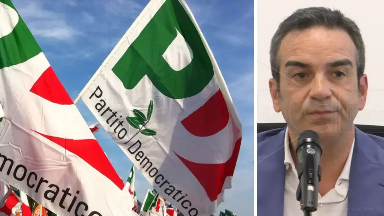 Le bandiere del Pd e il governatore Occhiuto