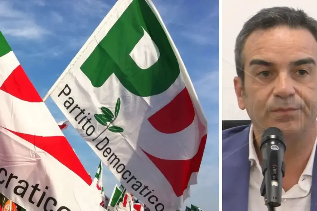 Le bandiere del Pd e il governatore Occhiuto