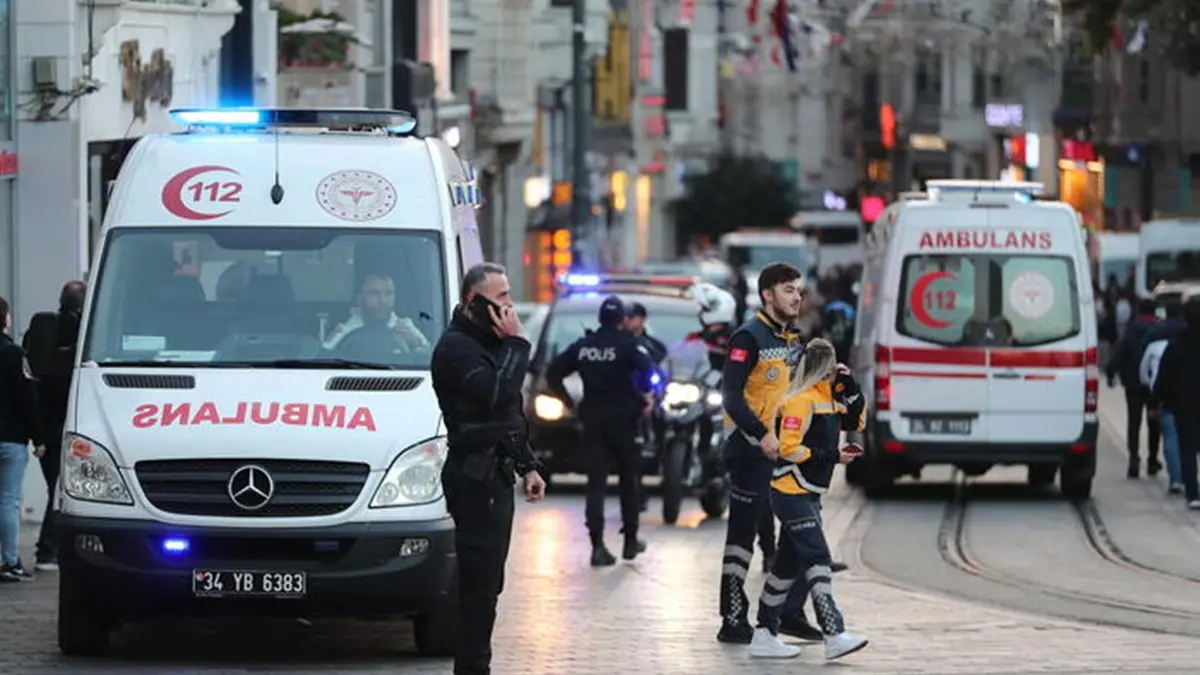 epa10303641 Turkish policemen try to secure the area after an explosion at Istiklal Street in Istanbul, Turkey, 13 November 2022. According to governor Ali Yerlikaya, an explosion that occurred at roughly 4.20 p.m. local time has resulted in losses and injuries. Emergency personnel were dispatched to the incident. EPA/ERDEM SAHIN , EPA
