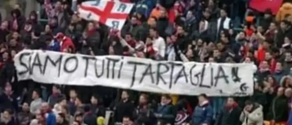 L'aggressione di Tartaglia a Berlusconi e lo striscione comparso a Cosenza