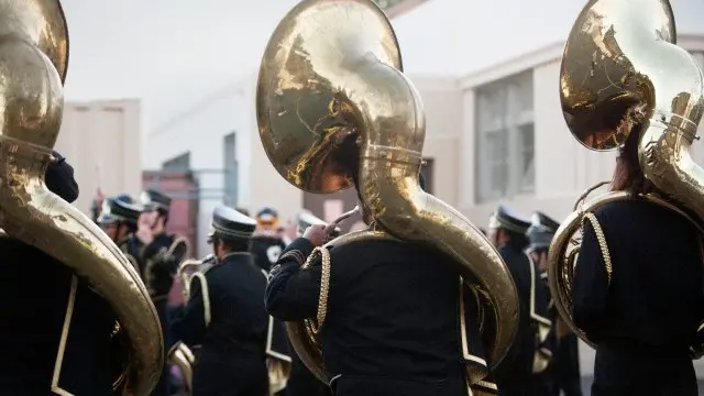 Los Angeles, California, USA --- Back view musical group playing sousaphone --- Image by \\u00A9 Jorge Cruz/moodboard/Corbis , \\u00A9 Jorge Cruz/moodboard/Corbis