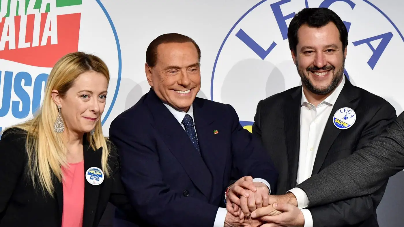 (L/R): Giorgia Meloni, President of Brothers of Italy party, Silvio Berlusconi, Leader of Italian right-wing party Forza Italia (Go Italy) and Northern League leader Matteo Salvini pose upon arrival at the Tempio di Adriano in Rome on March 1, 2018. Silvio Berlusconi\\'s rightwing coalition, which is on course to win the most votes in Italy\\'s election, is holding its first and last public meeting on March 1, in an attempt to quell speculation of severe internal divisions. Berlusconi, the flamboyant 81-year-old former prime minister and head of the centre-right Forza Italia (Go Italy), and the leaders of far-right parties the League and Brothers of Italy (FdI), Matteo Salvini and Giorgia Meloni, have not once met publicly in the entire election campaign. / AFP PHOTO / Alberto PIZZOLI , AFPN