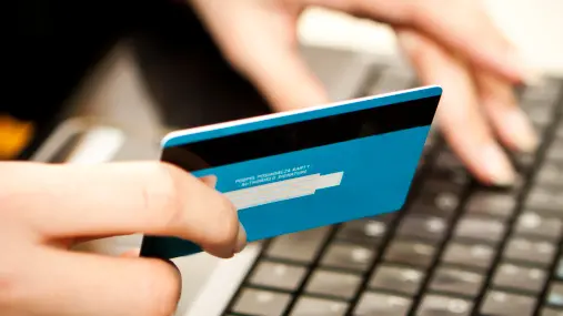 Online shopping with credit card on laptop , Getty Images/iStockphoto