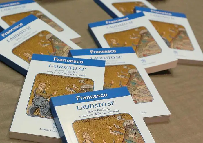 Copies of Pope Francis's encyclical, a collection of principles to guide Catholic teaching, entitled \\\"Laudato Si \\\" lies on a table during its official presentation at the Sinod hall in the Vatican, 18 June 2015. ANSA/ALESSANDRO DI MEO