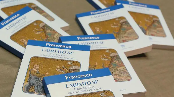 Copies of Pope Francis\\'s encyclical, a collection of principles to guide Catholic teaching, entitled \"Laudato Si \" lies on a table during its official presentation at the Sinod hall in the Vatican, 18 June 2015. ANSA/ALESSANDRO DI MEO , ANSA
