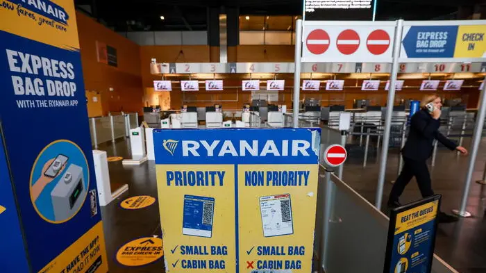 epa11674332 Ryanair signs near closed counters at the Terminal 1 of Brussels South Charleroi Airport (BSCA) as private security agents go on strike over working conditions, in Gosselies, Belgium, 22 October 2024. Due to an ongoing action by the security sector and the lack of staff to ensure security operations, all departing flights from Brussels South Charleroi Airport on 22 October have been cancelled, however all arrivals will proceed as planned, according to announcement by the BSCA, one of the main Hub in Europe of Ryanair. This is already the second action of security sector in one month at BSCA. EPA/OLIVIER HOSLET , EPA