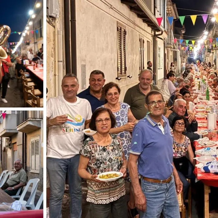 La \"Tavolata Spilingese\" quest'anno è stata un abbraccio lungo 110 metri: in via Carducci 350 commensali hanno celebrato radici e tradizioni
