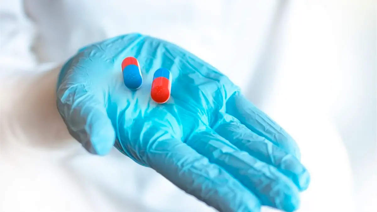 Antiviral pills on a doctor\\'s hand. Shallow DOF. 3d illustration , Getty Images/iStockphoto