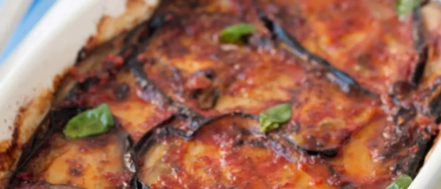 LA RICETTA DEL GIORNO | Parmigiana di melanzane: la regina dei piatti unici della cucina mediterranea