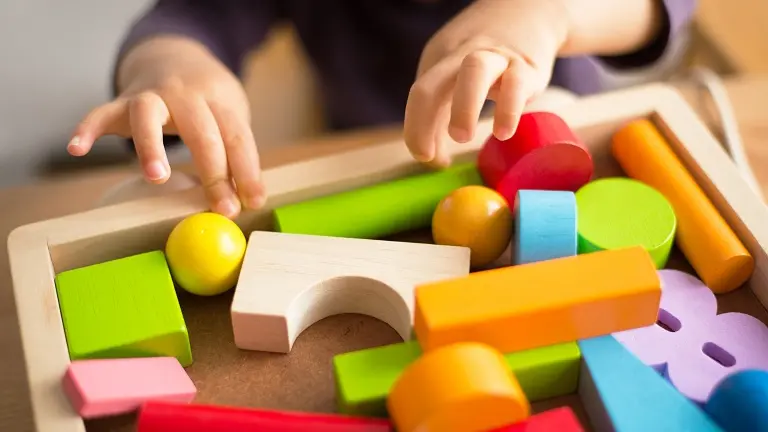 playing children with toys , Shutterstock