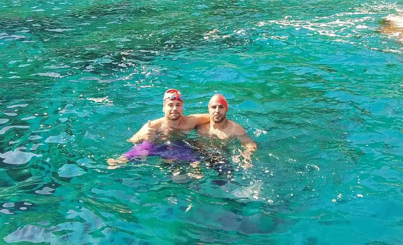 Gianvittorio Longo e Antonio Porro dell’Arvalia Nuoto Lamezia protagonisti della Traversata dello Stretto di Messina