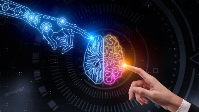 Hand pointing at glowing digital brain. Artificial intelligence and future concept. 3D Rendering , Getty Images/iStockphoto