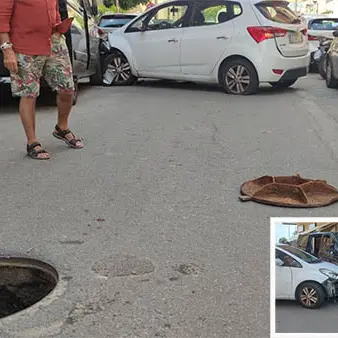 Salta tombino, auto contro furgone, Comune: colpa delle piogge