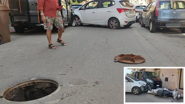 Salta tombino, auto contro furgone, Comune: colpa delle piogge
