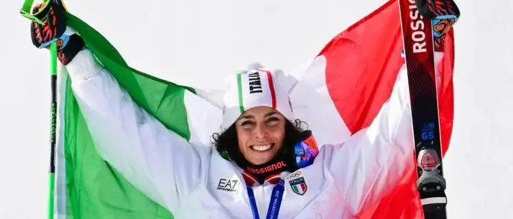 L’oro nero di Federica Brignone: in tribuna a Cortina spunta James, tra indizi social e un cappello tigrato che parla chiaro\n