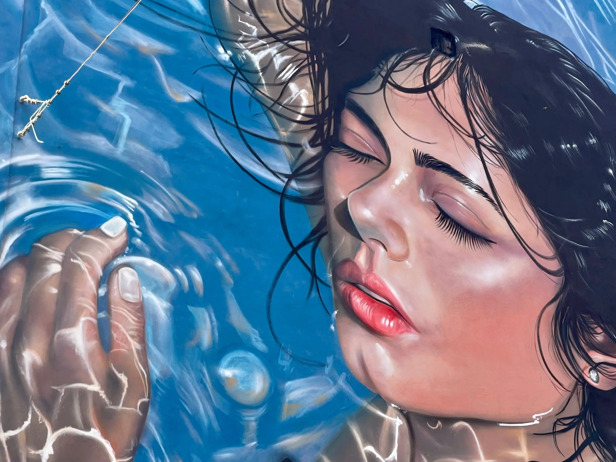 Cosenza, inaugurato il murale “Oltre il muro del silenzio”\n