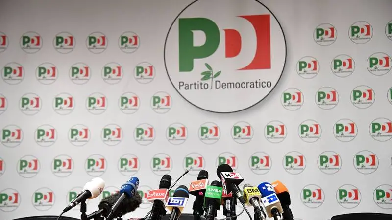 Microphones are set on a table before a press conference of former Prime Minister and leader of the Democratic Party (PD), Matteo Renzi, a day after Italy\\'s general elections on March 5, 2018 at the PD headquarters in Rome. The centre-left coalition led by Renzi\\'s Democratic Party (PD), in power going into the elections, is set to pick up just 23.6 percent of the vote in Sunday\\'s election, down on the last polling figures allowed before the election and a huge blow to the PD\\'s chances of being part of the next government. / AFP PHOTO / Alberto PIZZOLI (Photo credit should read ALBERTO PIZZOLI/AFP/Getty Images) , AFP/Getty Images