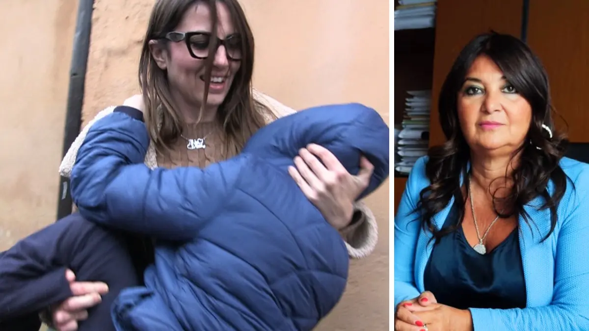 <p>Mamma Chiara con in braccio la piccola Giulia, a destra l'assessore regionale Pasqualina Straface</p>\\n