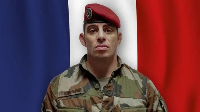 TOPSHOT - This handout photograph released on April 18, 2026 from the social media platform X (formerly Twitter) account of France\\'s Defence Ministry shows Sergeant Major Florian Montorio, of the 17th Parachute Engineer Regiment in Montauban, who was killed during an attack against UNIFIL (United Nations Interim Force in Lebanon) in southern Lebanon on April 18, 2026. Three others soldiers were wounded in the attack on UN peacekeepers in Lebanon that appeared to have been carried out by Hezbollah, French President said, an accusation the group has denied. (Photo by Handout / @Armee_Gouv (X account of France\\'s Defence Ministry) / AFP) / RESTRICTED TO EDITORIAL USE - MANDATORY CREDIT \"AFP PHOTO / @Armees_Gouv FROM THE X ACCOUNT OF FRANCE\\'S DEFENCE MINISTRY/ HANDOUT /\" - NO MARKETING NO ADVERTISING CAMPAIGNS - DISTRIBUTED AS A SERVICE TO CLIENTS , AFP