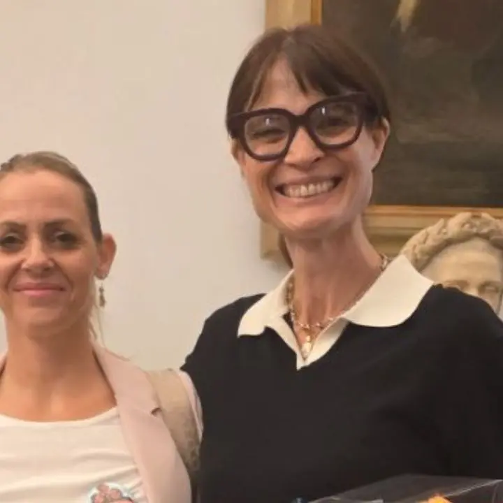 Da Saracena al Campidoglio: I Custodi del DNA premiati al Music@Mens con la voce di Laura Scrivo\n