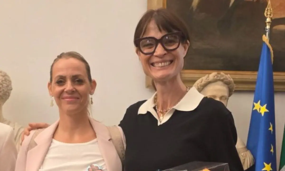 Da Saracena al Campidoglio: I Custodi del DNA premiati al Music@Mens con la voce di Laura Scrivo\n