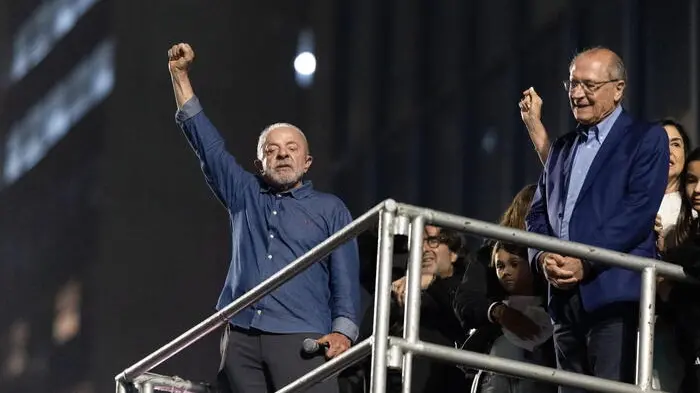 epa13332180 Brazilian President Luiz Inacio Lula da Silva (L), who won the runoff election with 51.79 percent of the vote, compared to 48.21 percent for far-right Senator Flavio Bolsonaro, reacts to supporters in Sao Paulo, Brazil, 25 October 2026. EPA/ISAAC FONTANA , EPA